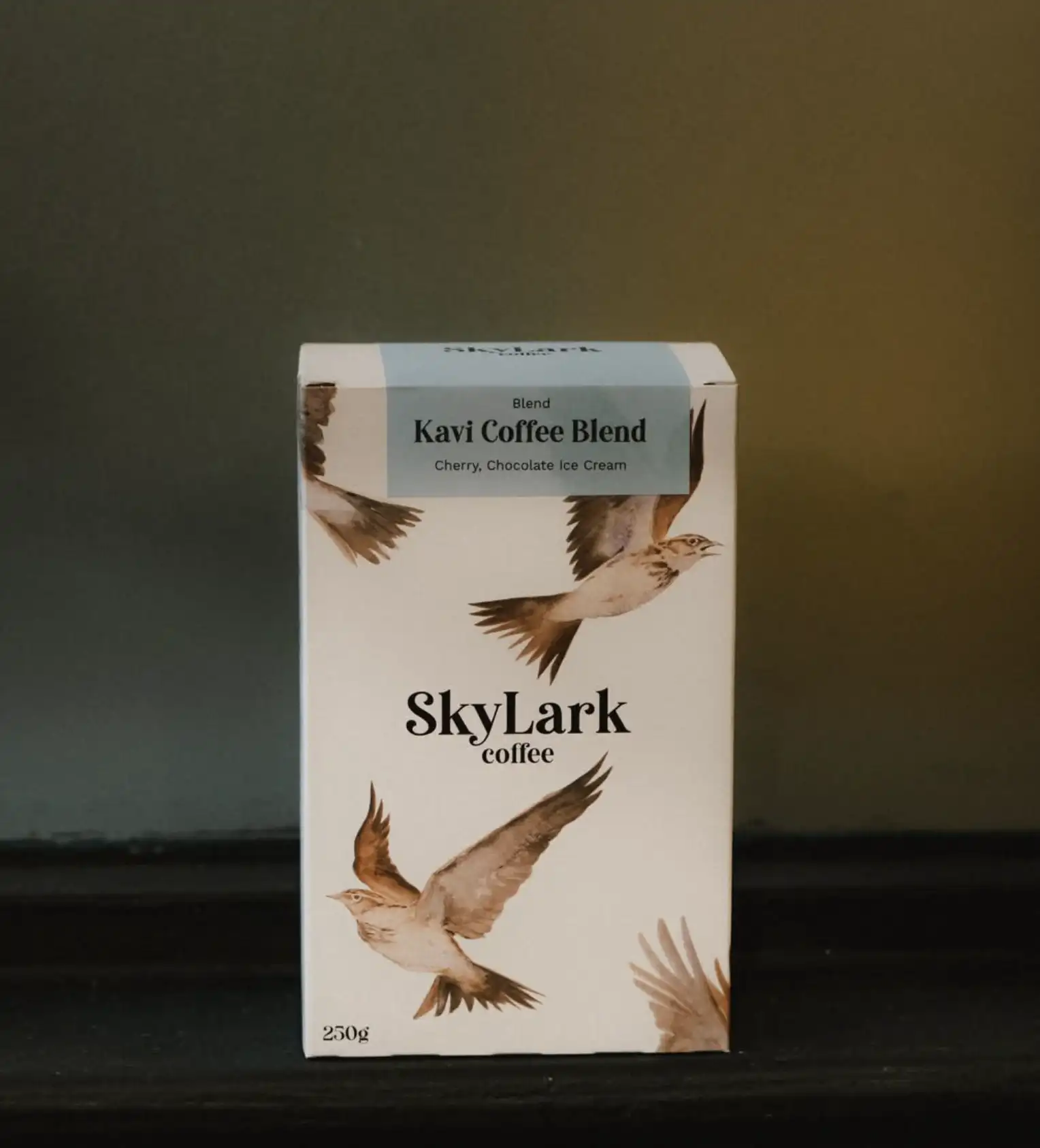 the kavi coffee blend by skylark coffee, in its illustrated box